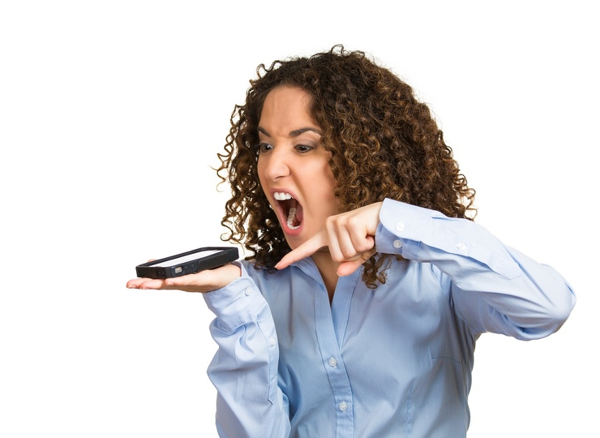 Image of a woman one the phone who is fed up with poor customer service