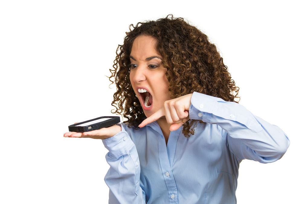 Image of an angry customer on the phone
