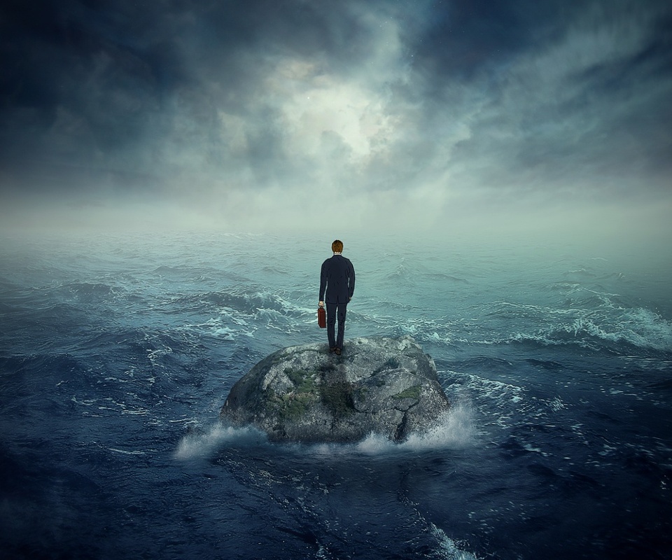 Image of an entrepreneur standing alone surrounded by water after loosing his groove